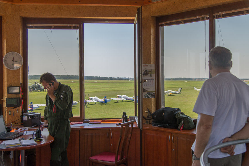 explaining at the tower how to arrive unexpected at the Mazury airshow
